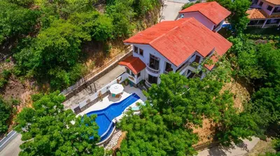an overhead view of a house with an orange roof at Casa Del Mar- 3 Br Ocean View House In Flamingo in Playa Flamingo