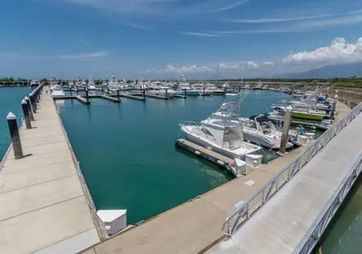 a group of boats docked at a marina at Hotel Le Priss in Manuel Antonio