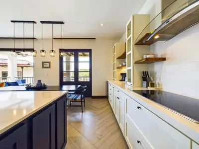 a kitchen with a large counter and a dining room at Casa Virginia #5 Private Pool -Ocean View At Las Catalinas in Playa Danta