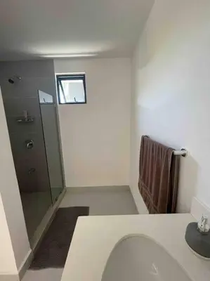 a bathroom with a toilet and a shower at Casa Pacifico 46 Tamarindo in Santa Cruz