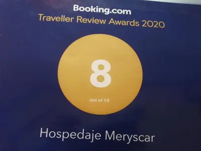 a yellow symbol with the number eight on it at Hospedaje Meryscar in Tortuguero