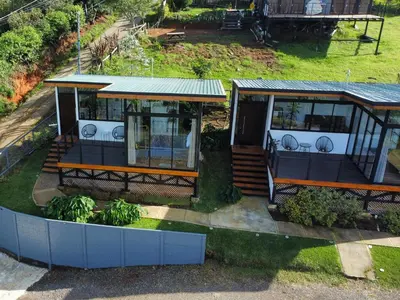 an aerial view of a house with a porch at Mon Bellis in El Copey