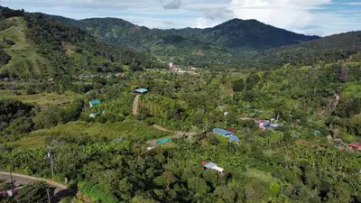 an aerial view of a village in the mountains at Mon Bellis in El Copey