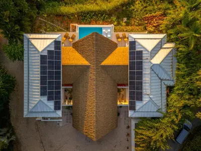 an overhead view of a building with two towers at Casa Frenchie - by Pura Villas in Dominicalito