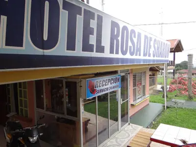 a sign on the side of a building at Hotel Rosa De Sharon in Marsella