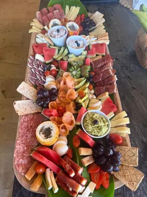 a tray of different types of food on a table at Veranera in Uvita