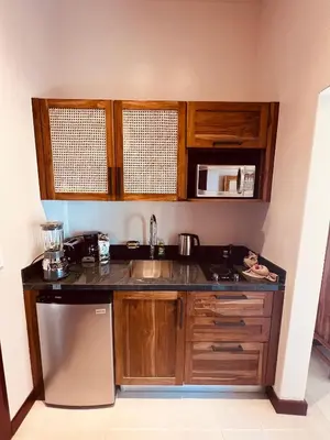 a kitchen with a sink and a counter top at Veranera in Uvita