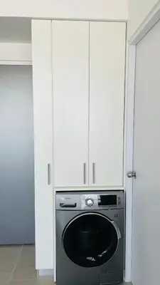 a kitchen with a dishwasher and white cabinets at SkyGarden Nunciatura Luxury Apartment #705 in San José