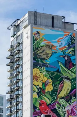 a building with a mural on the side of it at SkyGarden Nunciatura Luxury Apartment #705 in San José