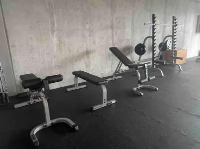 a gym with several exercise equipment in a room at Pura Vida Hub - Iconnia - Cash Only in San José