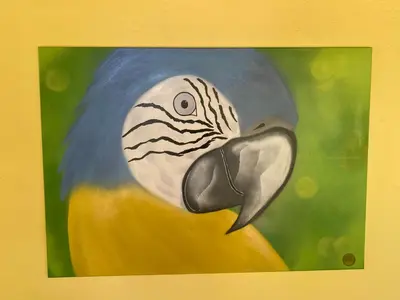 a painting of a parrot with a mustache on its head at Hotel Hibiscus Cabina 4 in Playa Junquillal