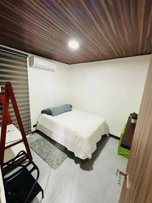 a bedroom with a bed in a room at Casas Plamont in Fortuna