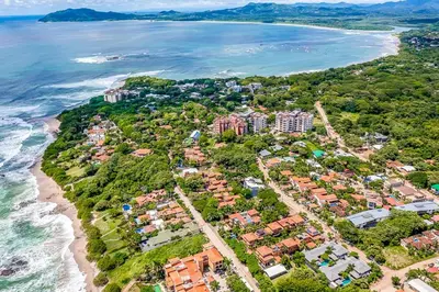an aerial view of the beach and the ocean at Private Pool, 3bd Villa near the Beach in Tamarindo