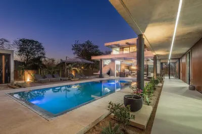 an image of a swimming pool in a house at New 6 bd Modern Home Walk to Beach in Tamarindo
