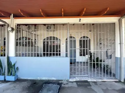 a gate in the front of a building at Escape to Pier Sands Casita#2- Close to the Beach. in Puntarenas