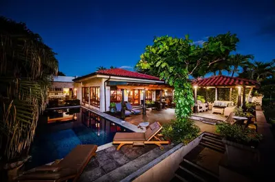 an aerial view of a house with a swimming pool at Exclusive Beachfront Villa Private Pool, Koi, BBQ in Tamarindo