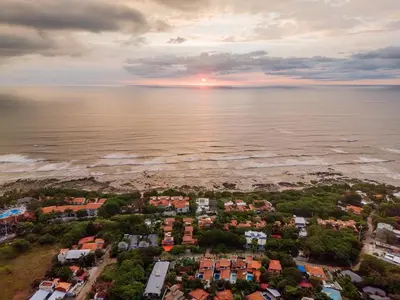 an aerial view of a city and the ocean at Relaxing Tropical Villa Near the Beach in Tamarindo