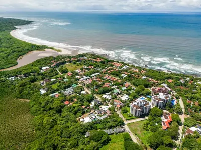 an aerial view of a town next to the ocean at Relaxing Tropical Villa Near the Beach in Tamarindo