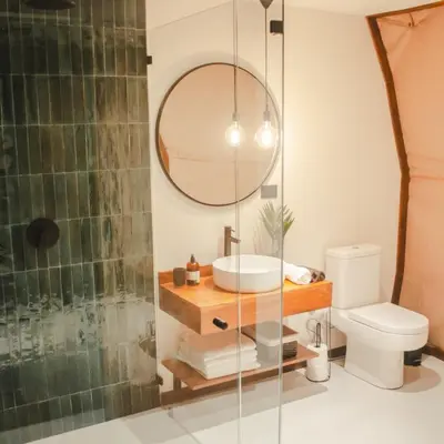 a bathroom with a sink and a mirror at Ananta Forest - Sunset & Gulf View - Glamping Dome and Mountain House in Monteverde Costa Rica