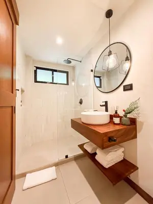 a bathroom with a sink and a shower at Ananta Forest - Sunset & Gulf View - Glamping Dome and Mountain House in Monteverde Costa Rica
