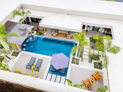an aerial view of a house with a swimming pool at Private Pool with swim up bar and TWO Beaches in Tamarindo
