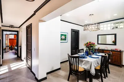 a dining room with a table and chairs at Luxury Villa With Beach Access and a Private Pool in Tamarindo
