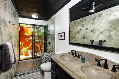 a bathroom with a sink and a toilet at Luxury Villa With Beach Access and a Private Pool in Tamarindo