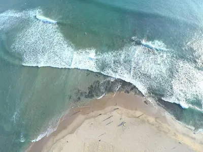 an aerial view of a beach and the ocean at Light & Breezy Beach Side Condo! in Tamarindo