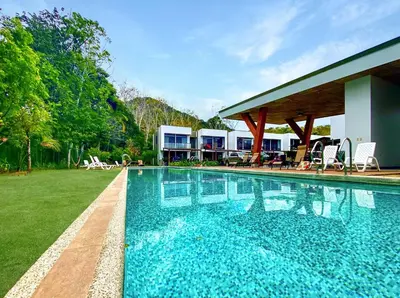 an image of a swimming pool at a resort at Exclusive fully equipped Condo with great pool in Jacó