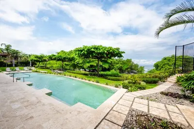 an image of a swimming pool at a house at Beachfront Easy Beach access, security & cameras in Tamarindo