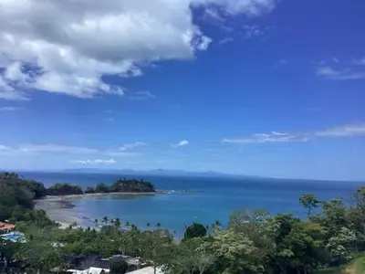 an island in the middle of a large body of water at Apartamento hermoso Playa Mantas in Punta Leona