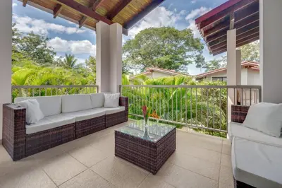 a living room with a couch and a table at Nikla's - Villaggio 6 in Potrero