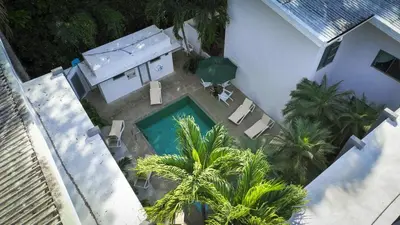 an overhead view of a swimming pool next to a house at Condo Casa Blanca 6 - modern 2BR,2BA near to Beach & Town in Potrero