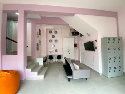 a living room with a lego house at Casa Pandora Hostel Women Only in San José