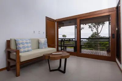 a living room with a couch and a table at Casa Kabuae in Portalón