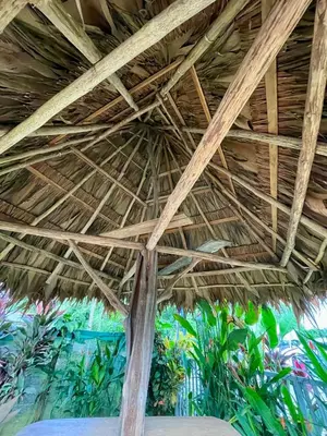 a straw roof on top of a table at Apartamentos Equipados DMR #3 in Uvita