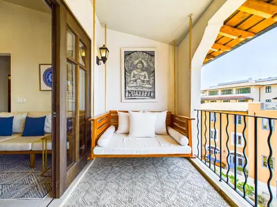 a balcony with a white couch on a balcony at Paseo Divino At Las Catalinas in Playa Danta