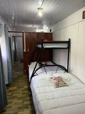 a bedroom with two bunk beds in a room at Trailer House in Vara Blanca