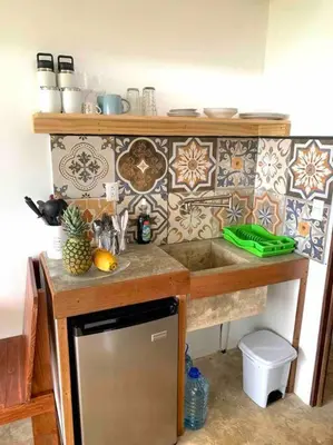 a kitchen with a sink and a counter top at Cotinga Nest - King Bed, Ocean View in San Pedrillo