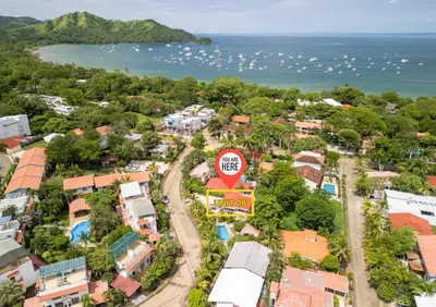 an aerial view of a city with the ocean at Pura Armonia Condo with Outdoor Patio in Coco