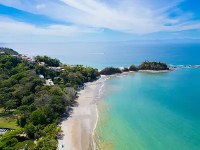 an aerial view of a beach and the ocean at Deluxe Apt with Ocean View & Beach Access only 1 hour drive from San Jose in Puntarenas