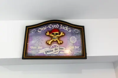 a framed picture on a wall with a skull at Deluxe Apt with Ocean View & Beach Access only 1 hour drive from San Jose in Puntarenas