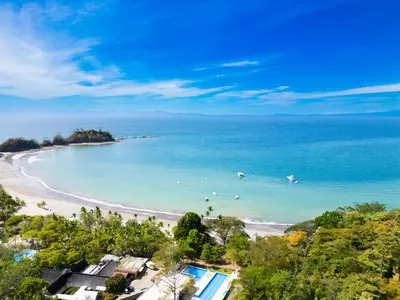 an aerial view of a beach and the ocean at Deluxe Apt with Ocean View & Beach Access only 1 hour drive from San Jose in Puntarenas