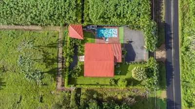 an overhead view of a house with a red roof at Casa Oasis La Fortuna Private Pool AC & WiFi 100 mbps in San Francisco