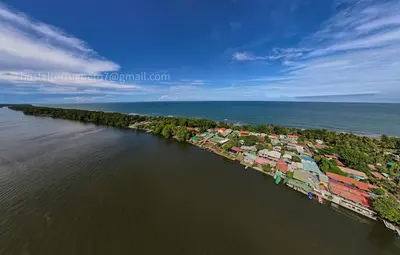 an aerial view of a small island in the water at Tortuguero7 lake view in Tortuguero