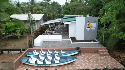 a group of boats sitting on top of a patio at Tortuguero7 lake view in Tortuguero