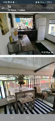 a kitchen and a dining room with a table and chairs at La posada de nana in Alajuela City