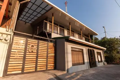 a building with a balcony on the side of it at 1968house in Monteverde Costa Rica