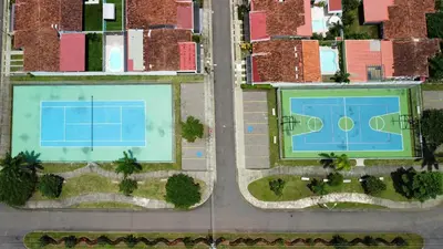 two large swimming pools in a city at Beachfront Condo - your Oasis with pool and Wi-Fi in Bejuco