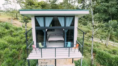 an overhead view of a tiny house with a porch at Cala-Ranch Suites - Dream in Quesada